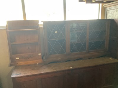 Lot 17 - A modern oak dwarf bookcase with leaded glazed...