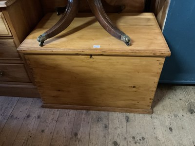 Lot 27 - A pine blanket chest with cast metal handles,...