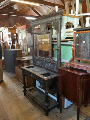 Lot 29 - A 19th century carved oak hall stand with...