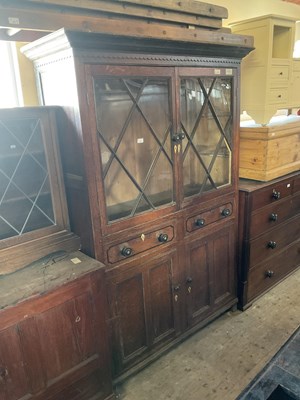 Lot 30 - An 18th century oak cabinet with moulded...