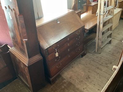 Lot 45 - A 19th century mahogany bureau, the fall front...