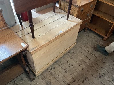 Lot 48 - A vintage pine blanket chest with iron handles,...