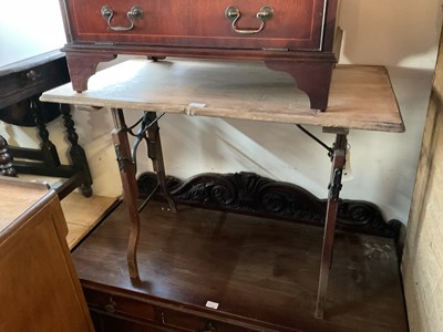 Lot 77 - A vintage folding table, width 90cm, with a...