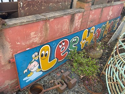 Lot 113 - A painted wooden sign within cast iron frame, '...