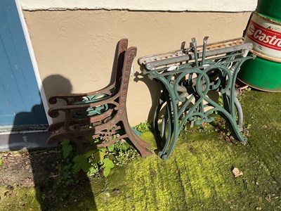 Lot 116 - Two metal framed bench ends, with two metal...
