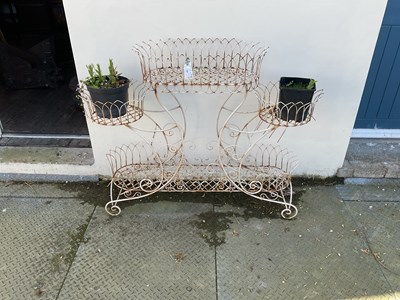 Lot 140 - A modern white painted wirework garden planter,...