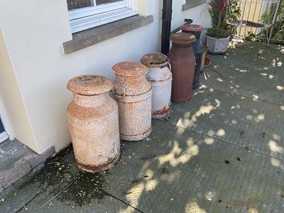 Lot 141 - Five vintage milk churns (5)