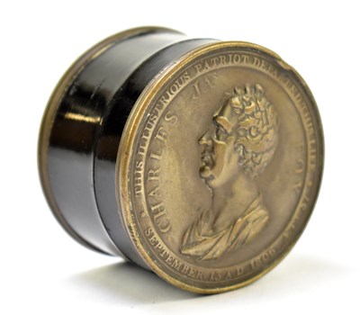 Lot 36 - A 19th century silver plated and black lacquered snuff box