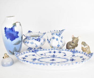 Lot 490 - ROYAL COPENHAGEN; three porcelain ornaments to...