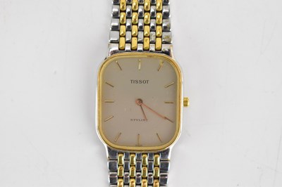Lot 1419 - TISSOT; a unisex Stylist bi-colour watch, the...