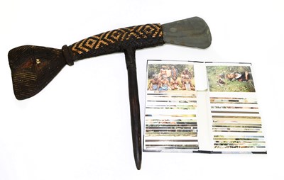 Lot 1117 - PAPUA NEW GUINEA; a carved wood and wicker...