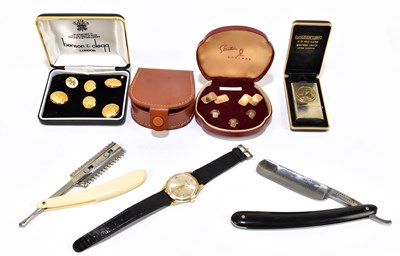 Lot 1279 - A cased set of gold plated cufflinks and shirt studs