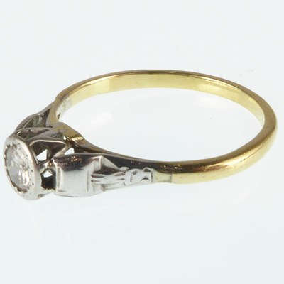 Lot 1014 - An 18ct gold ring set with cut brilliant...