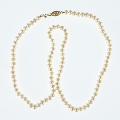 Lot 1270 - A single row of cultured pearls united with a...