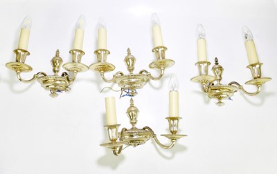 Lot 1191 - Four silvered metal twin branch wall lights...