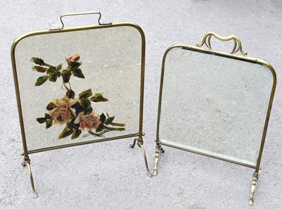 Lot 1169 - Two brass framed mirrored fire screens (2)