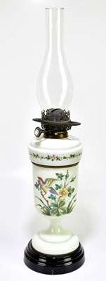 Lot 1500 - A Victorian opaque glass oil lamp with painted...