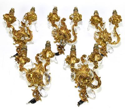 Lot 1535 - A part set of five Louis XV-style gilt metal wall lights
