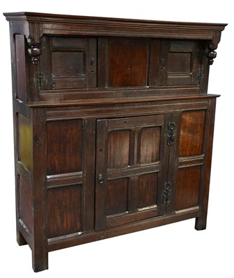 Lot 1544 - An 18th century oak court cupboard, the top...
