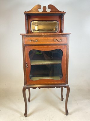 Lot 544 - An Edwardian inlaid glazed music cabinet with...