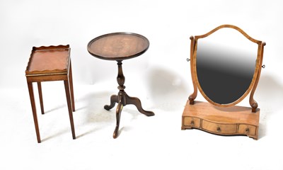 Lot 26 - A Victorian mahogany shield-shaped swivel...