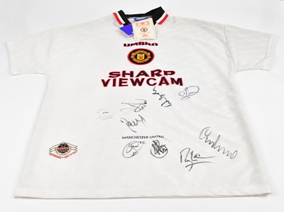 Lot 2260 - MANCHESTER UNITED; an Umbro football shirt...