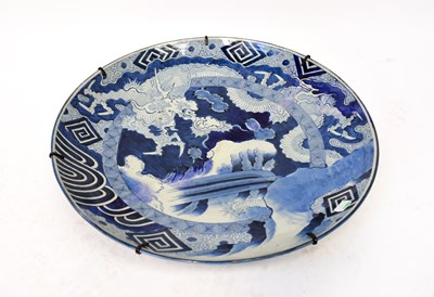 Lot 506 - A 19th century Japanese blue and white charger...