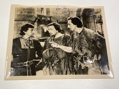 Lot 2206 - BASIL RATHBONE; a black and white promotional...