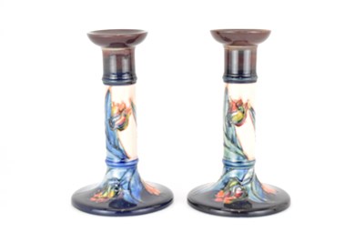 Lot 497 - WALTER MOORCROFT; a pair of tulip pattern...