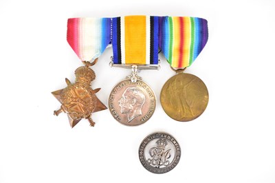 Lot 606 - A trio of WWI medals awarded Gnr. H. G. Atkins...