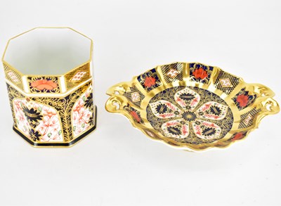 Lot 489 - ROYAL CROWN DERBY; a small twin-handled bowl...