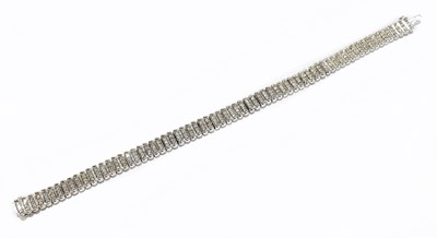 Lot 1210 - A white metal diamond set tennis bracelet