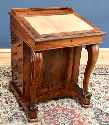 Lot 1543 - A late 19th century rosewood Davenport, with...