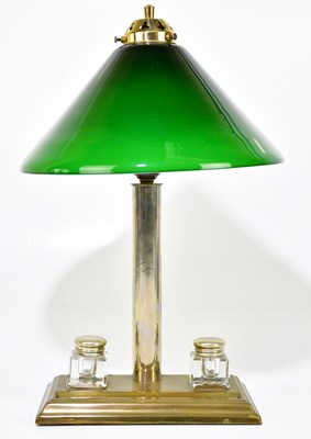 Lot 1494 - A brass plated desk lamp, the conical green...