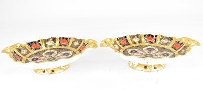 Lot 488 - ROYAL CROWN DERBY; two Imari 1128 pattern twin-...