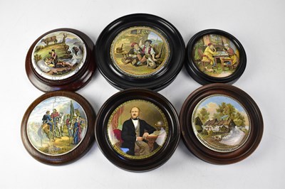 Lot 518 - Seven 19th century Pratt Ware framed pot lids...