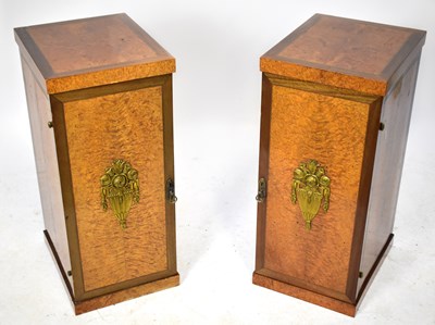 Lot 1587 - A pair of French amboyna bedside cupboards