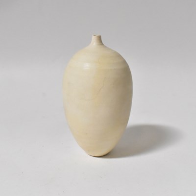 Lot 512 - A slender ivory ribbed vase, incised marks to...