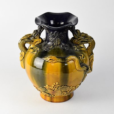 Lot 475 - An early 20th century amber and purple drip...