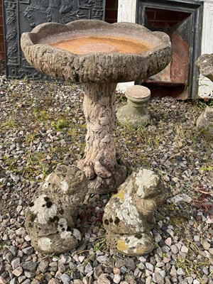 Lot 575 - A reconstituted stone two piece bird bath, and...