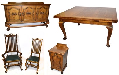 Lot 1766 - An early 20th century oak dining suite with...