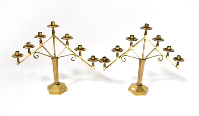 Lot 462 - A pair of seven light candlesticks on...