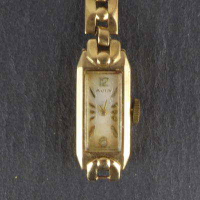Lot 1391 - AVIA; a ladies' 9ct gold tank-style wristwatch,...