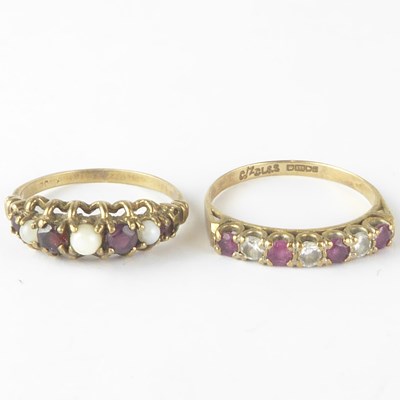 Lot 1094 - Two 9ct gold dress rings, one with four small...