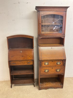 Lot 546 - An early 20th century oak bureau bookcase,...
