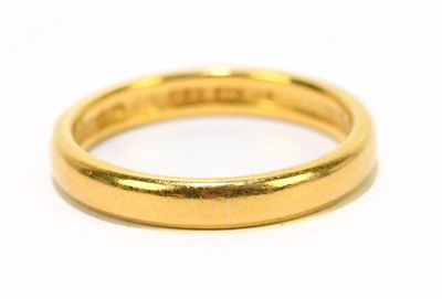 Lot 1243 - A 22ct yellow gold wedding band, approx size P, approx weight 5.1g.