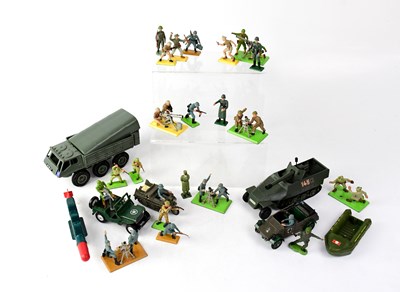 Lot 370 - A collection of military figures and vehicles...