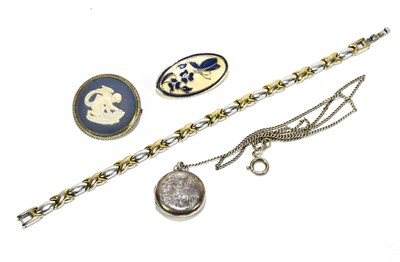 Lot 1282 - WEDGWOOD; a hallmarked silver mounted brooch