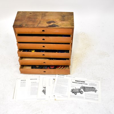 Lot 449 - MECCANO; a six-drawer chest containing a large...