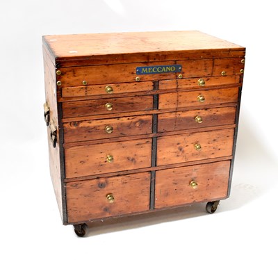 Lot 454 - MECCANO; a large pine ten-drawer Meccano chest...